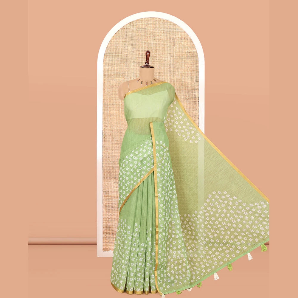 Pothys Green Linen Cotton Saree Features Half-And-Half-Style Flower Motifs Print, a Piping Border, and a Matching Blouse